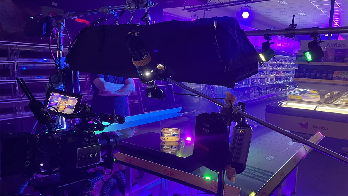 DMG lighting fixtures immerse products in vivid colored game show lighting for a Netto Marken-Discount commercial.