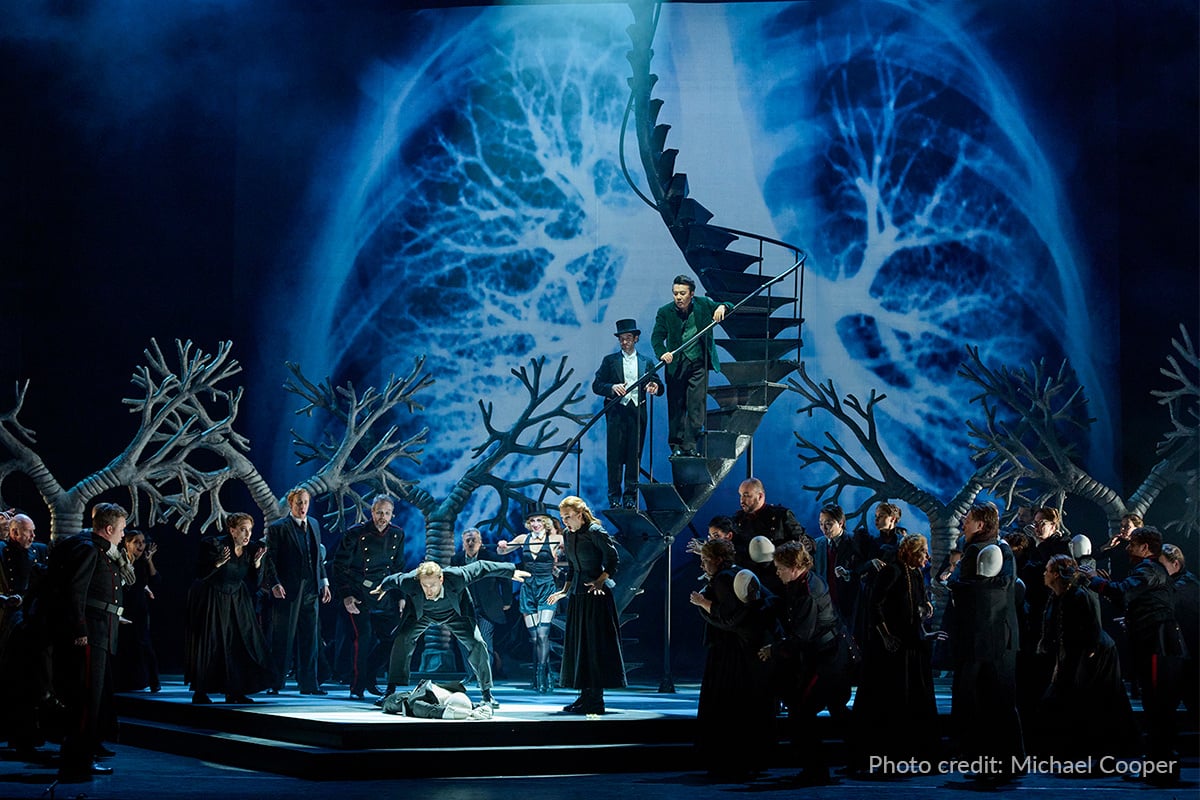 The Faust set design for Canadian Opera Company included a big back cyc behind an X-Ray set piece and a spine-like staircase center stage.