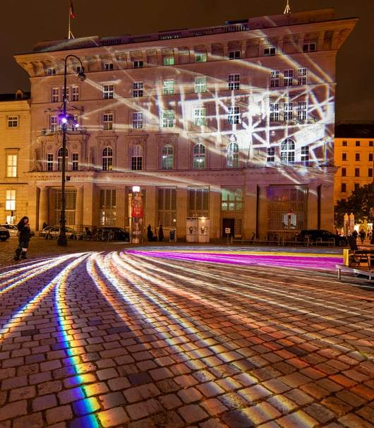 The light intervention: Chromotopia Politeía created with Rosco Permacolor Dichroic glass filters illuminating Constitutional Court in Vienna.