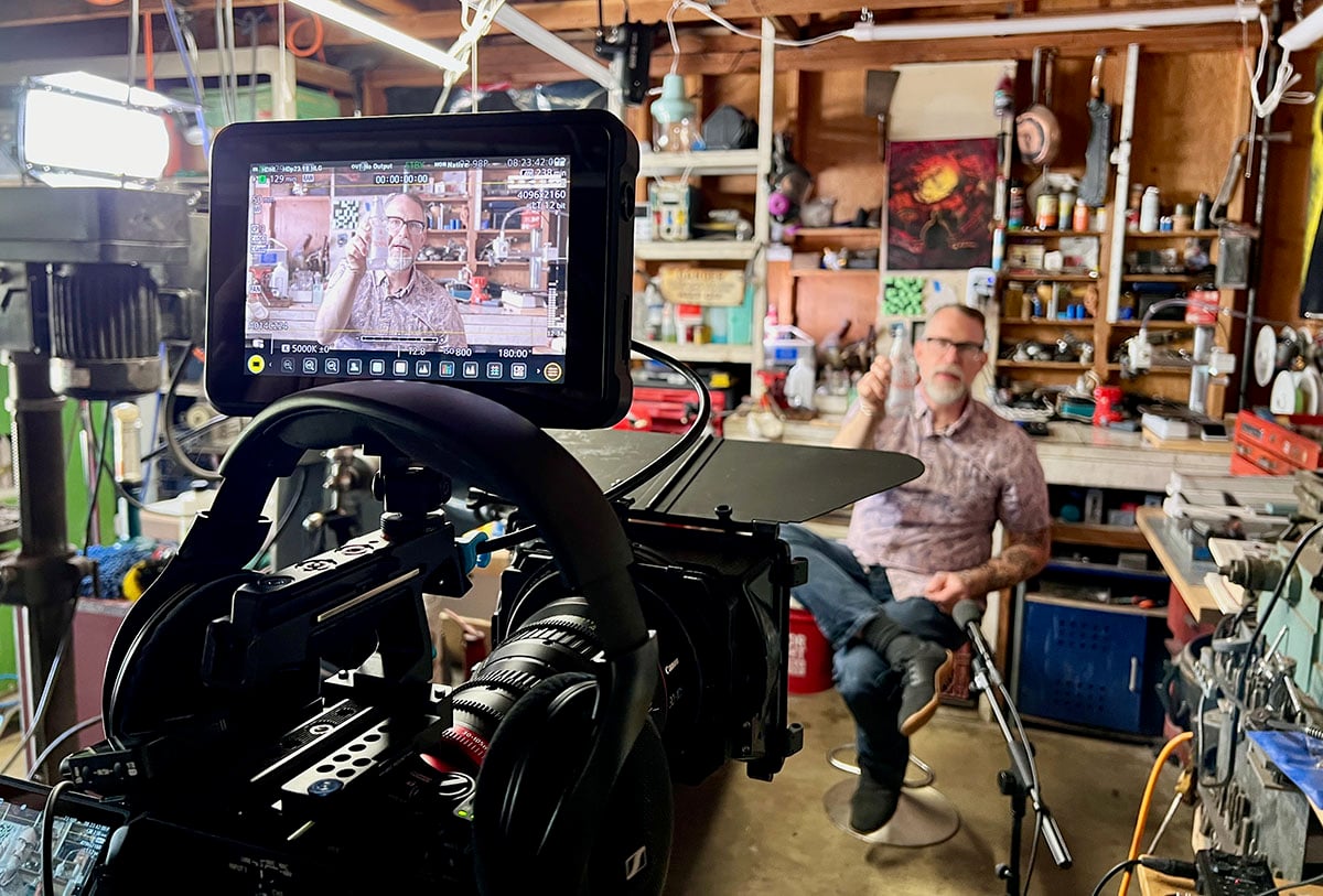 Adolph Gasser’s grandson lit by a DMG MINI simulating sunlight streaming through a garage door on the set of the documentary Being Adolph Gasser.