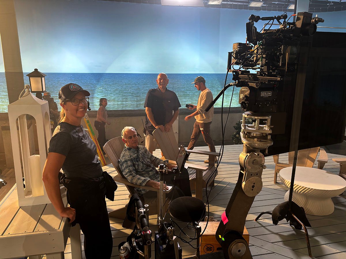 The filmmakers on set with a Rosco SoftDrop in the background.