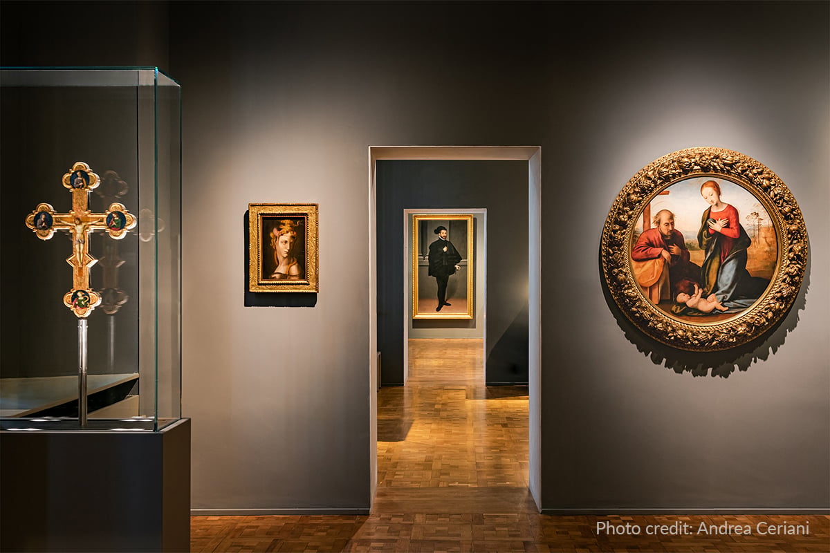 The Cross displayed in the Poldi Pezzoli Museum gallery alongside other works in the collection.