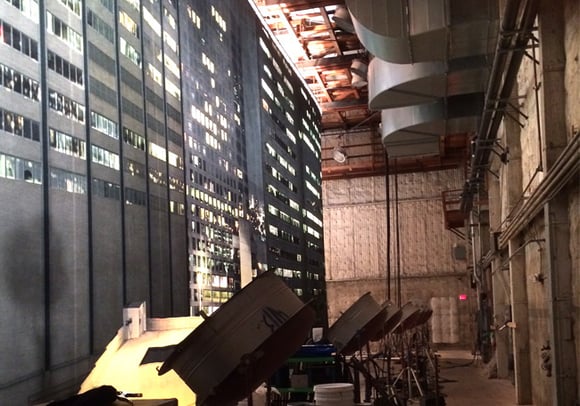 Rosco SoftDrop backlit from the ground up with studio lighting fixtures on the floor.