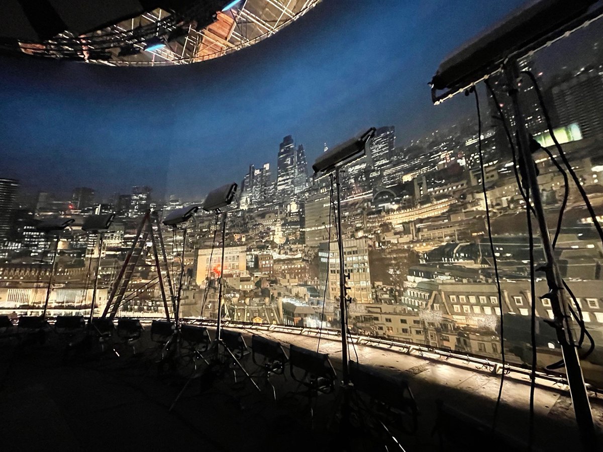 Film lights illuminate a large Rosco SoftDrop inside the BT Tower set to create a 360º London background for The Union on Netflix.