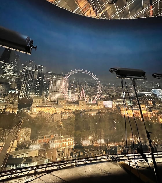 A Rosco SoftDrop is backlit with different light sources and color temperatures to provide a 360° nighttime view outside of the BT Tower set for The Union on Netflix.