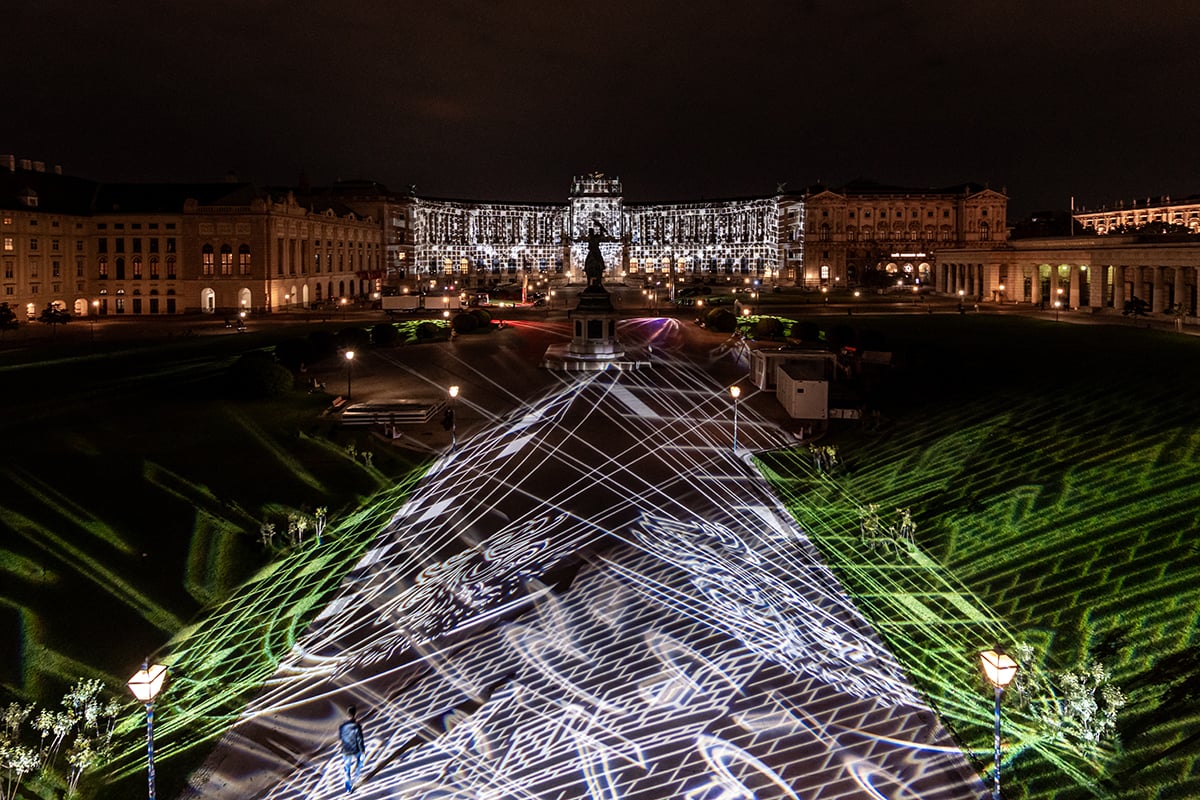 Gobo images of iconic motifs from Austria’s coat of arms, including the wall crown, eagle’s head, and hammer and sickle.