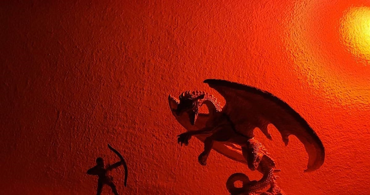 Dragon miniature lit in orange.