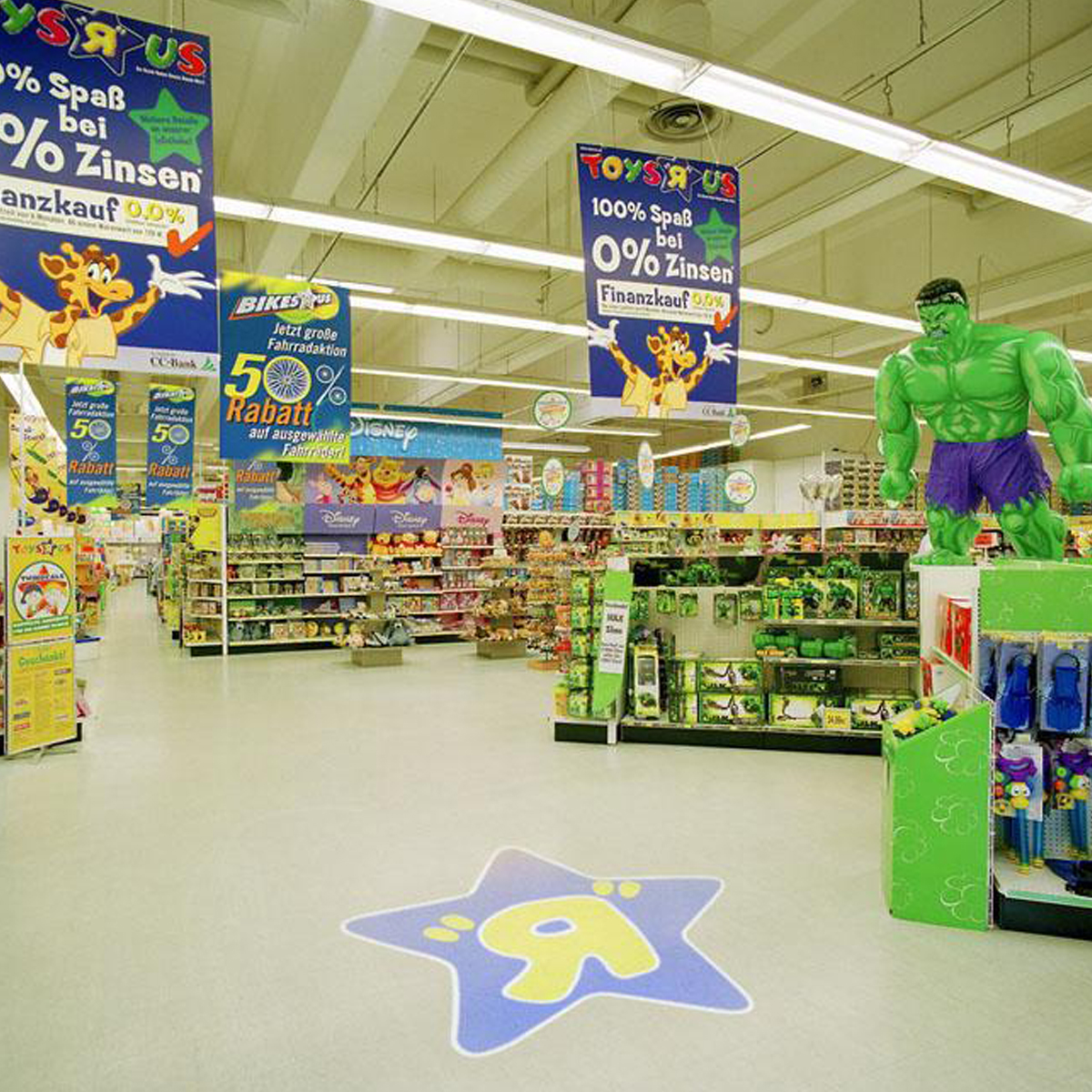 A brand logo projected onto a retail floor with a Rosco gobo