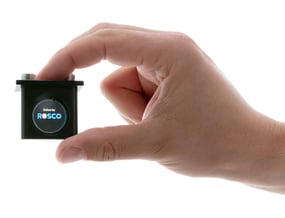 Rosco Image Spot Mini gobo holder held in hand.