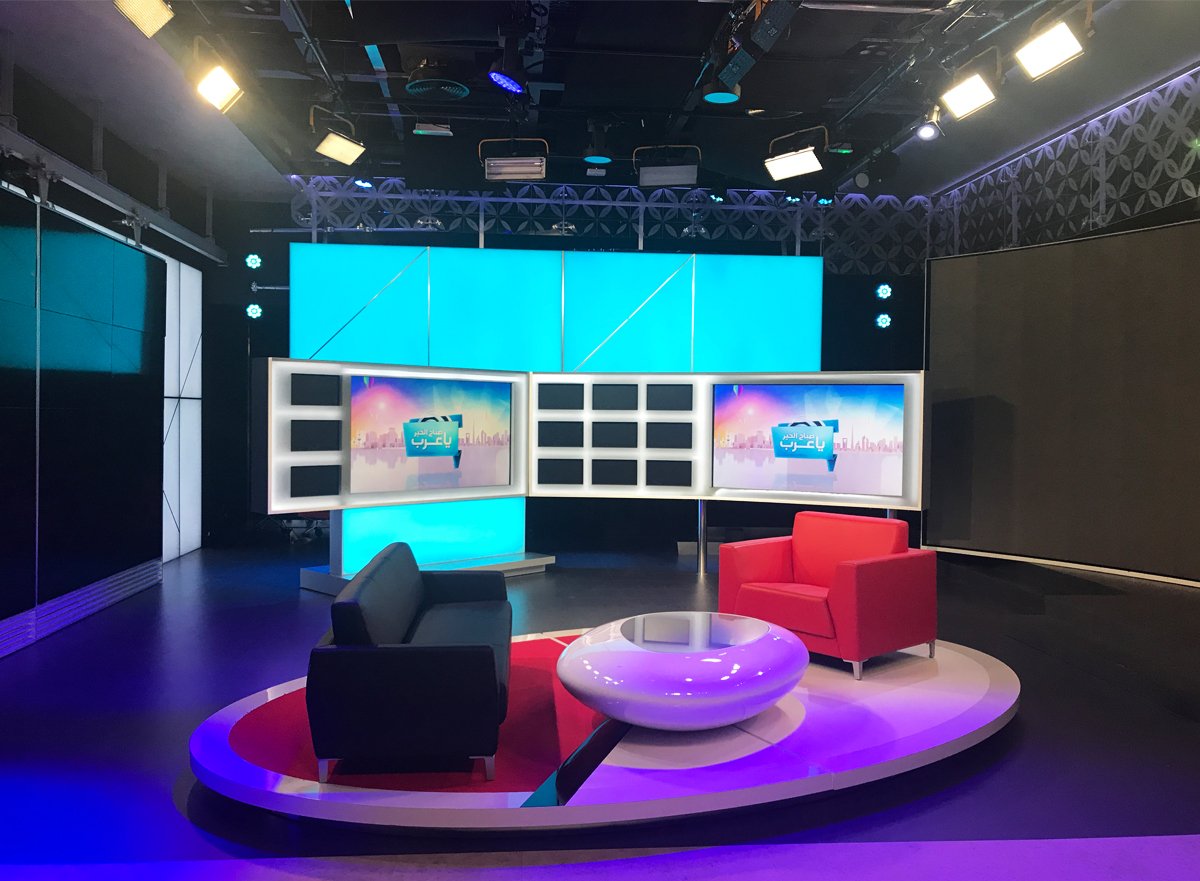 Broadcast studio design for MBC Dubai Studio City featuring color changing, backlit panels using LED tape from Rosco..