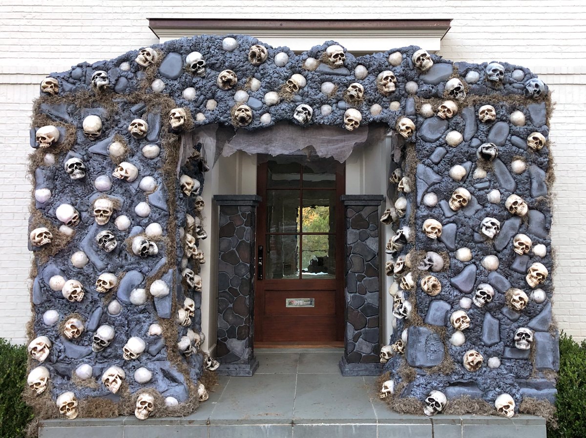 This archway of foam skulls is a perfect example of durable Halloween scenery.