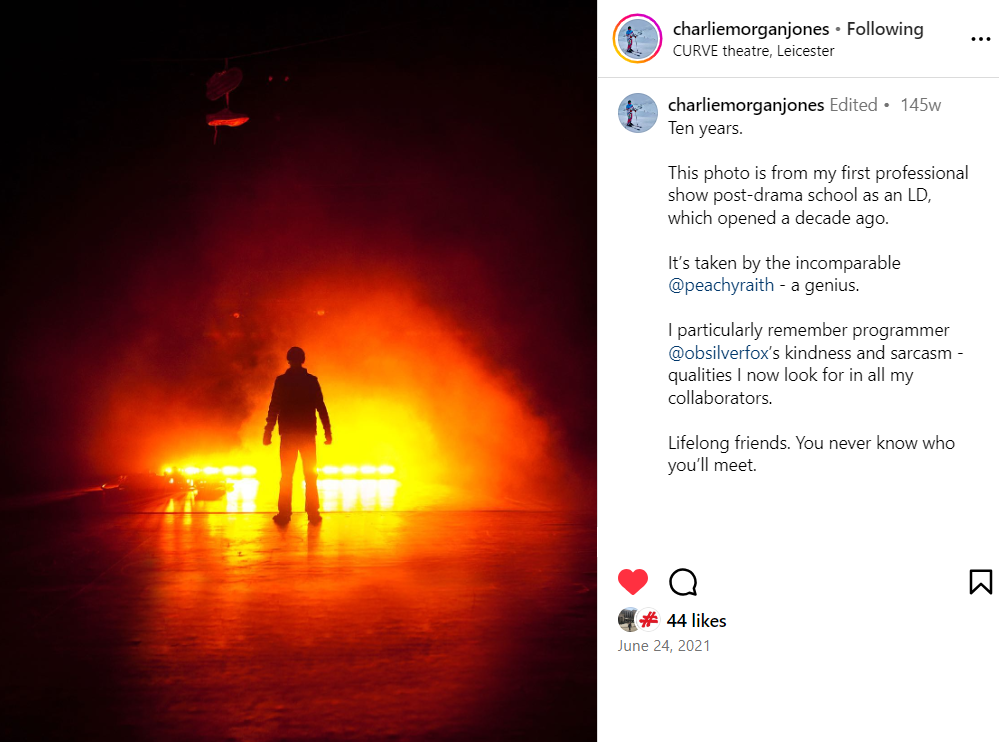 Charlie Morgan Jones has backlit an actor onstage in a vibrant orange hue.