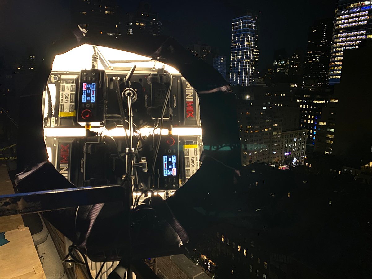 Two DMG MINI fixtures rigged together to light a night exterior scene.
