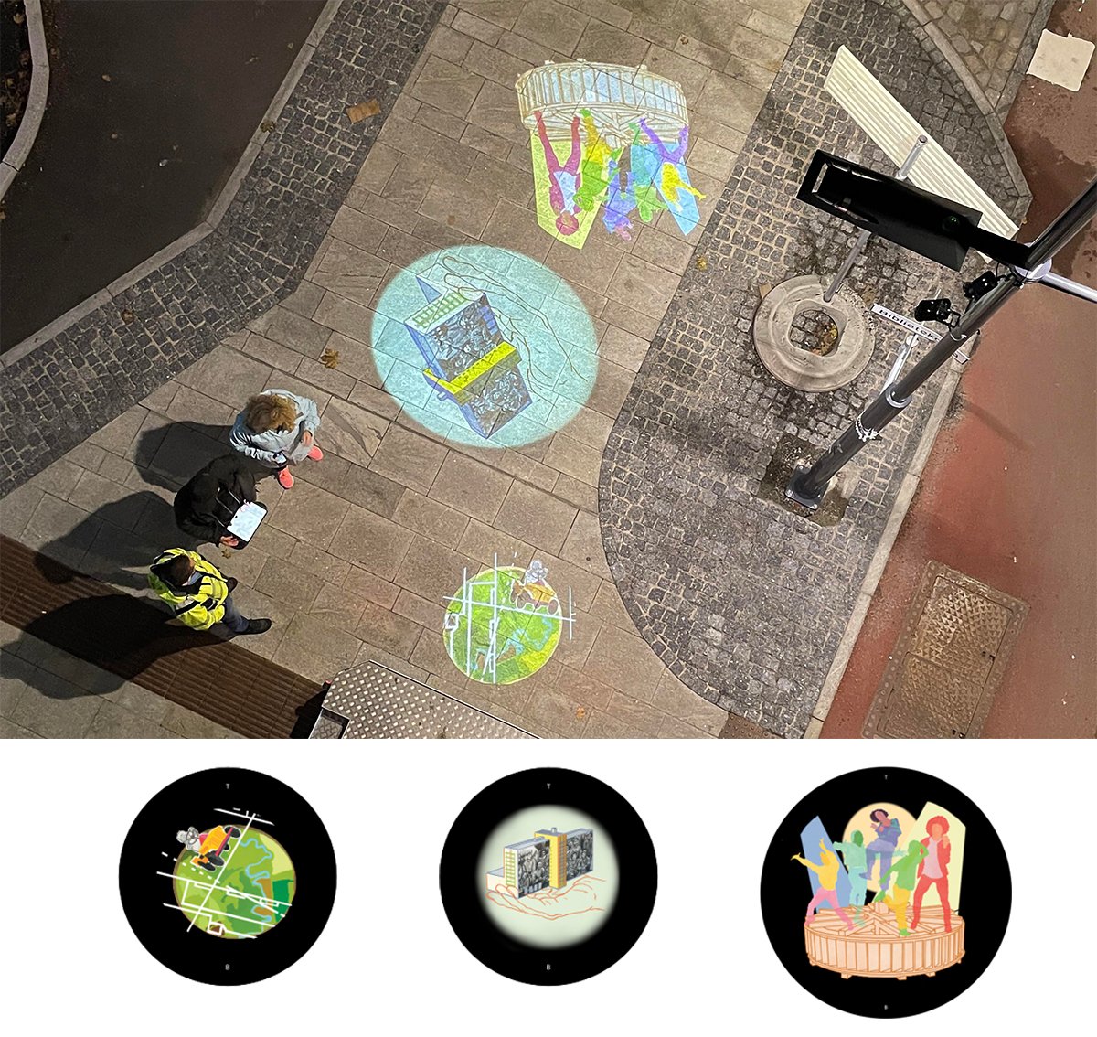 Gobo projections of a boy in a pedal car, a hand holding a model of a hospital and young people dancing on a water wheel.