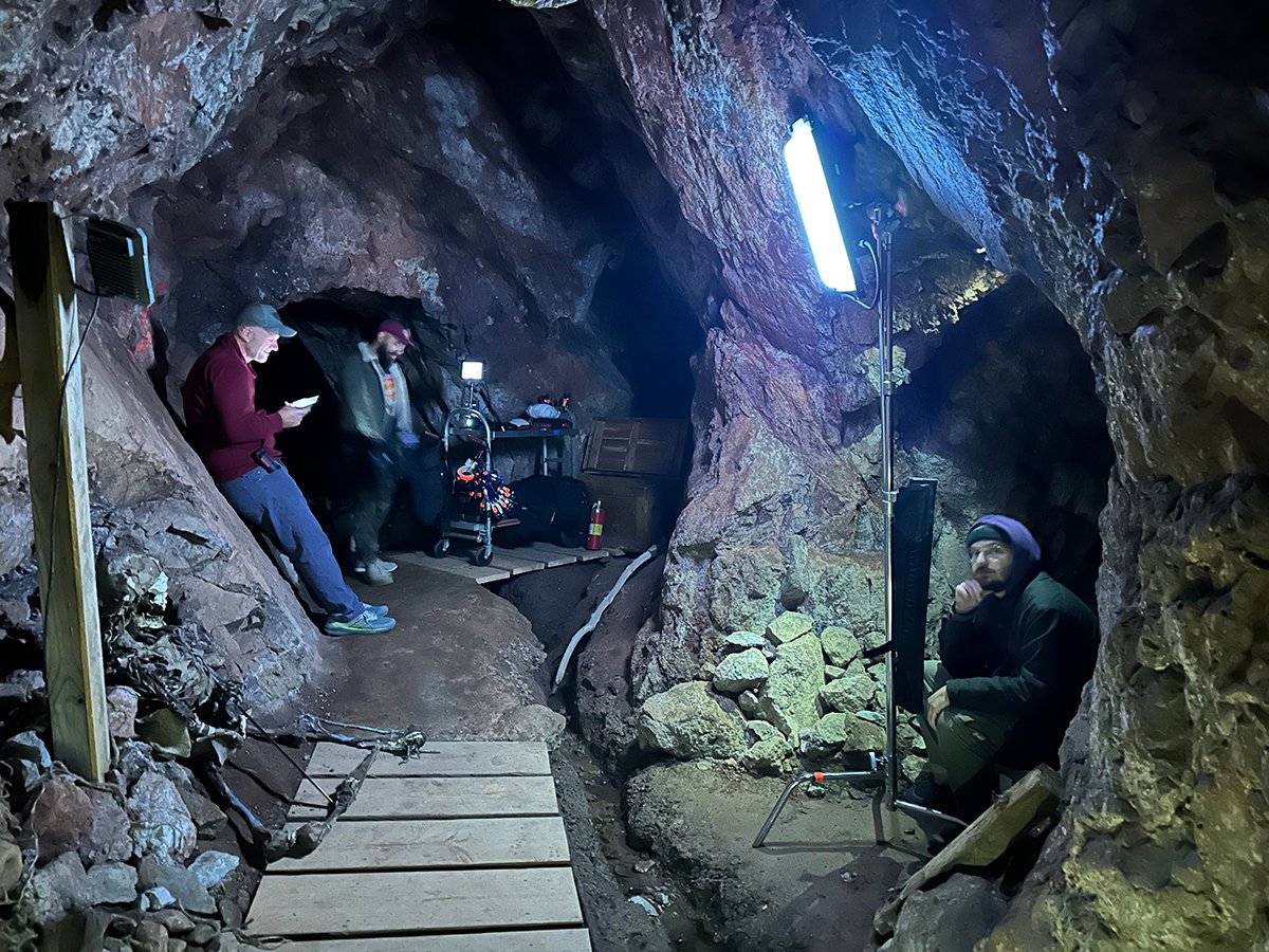 DMG MINI mounted on a tripod lights the cave interior. for the shooting of a Western horror film The Vast Lonesome.