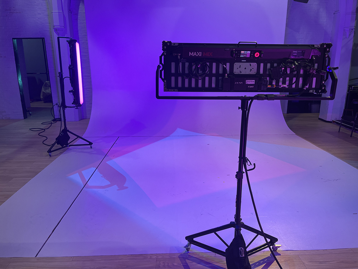 Two Rosco DMG MAXI fixtures light the video studio cyclorama in a vibrant pink and purple blend for JORDANS at The Public Theater.