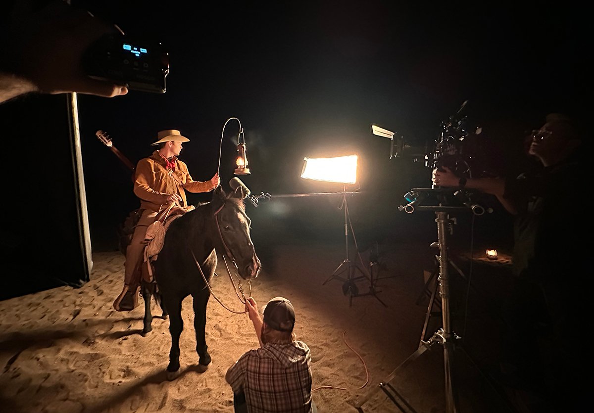 DMG Lights illuminate an actor on a horse while shooting a Western horror film The Vast Lonesome.