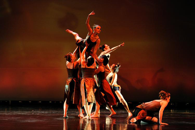 Lighting Designer Angela Marks used R325 Henna Sky in her dance lighting design to bathe the performers on stage in an earthy red.