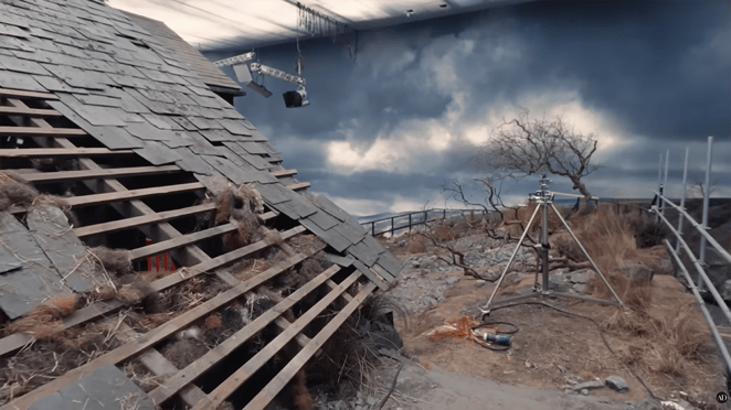 Wuthering Heights set with grass, greenery, slate, and a Rosco SoftDrop in the background.