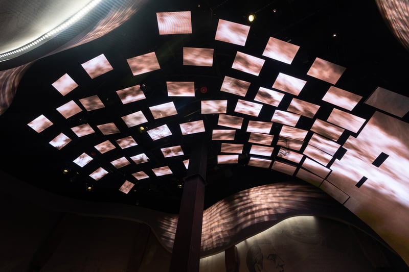 Projections from Rosco X-Effects LED HO RGBW reinforce the flowing motion of the media content.