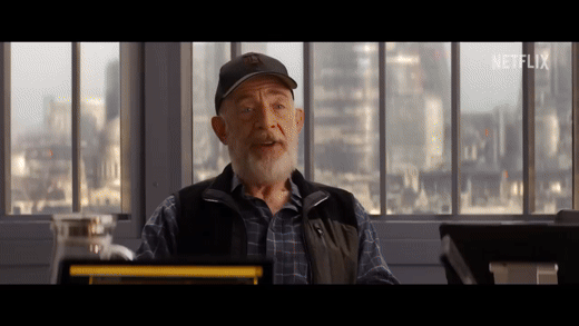 Actors J.K. Simmons, Halle Barry, and Mark Walberg inside the BT Tower set that features a large London backdrop from Rosco for the Netflix movie "The Union."