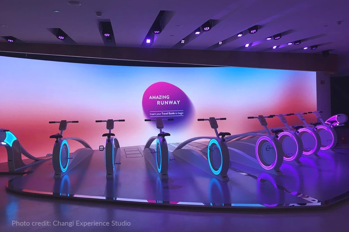 Miro Cubes 4C immerse the Amazing Runway cycling area inside Changi Experience Studio in bold purple colour.
